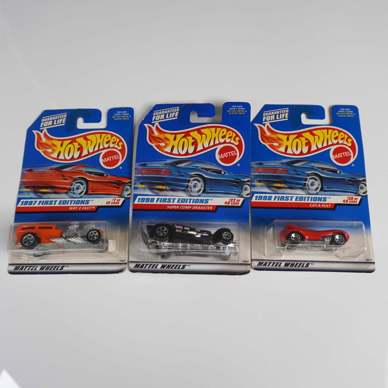 10pc Hot Wheels First Editions Die-Cast Cars: Collection of ten Mattel Hot Wheels die-cast cars from the 1997 and 1998 First Editions series, each in original packaging. These early edition cars are part of limited runs that introduced new castin