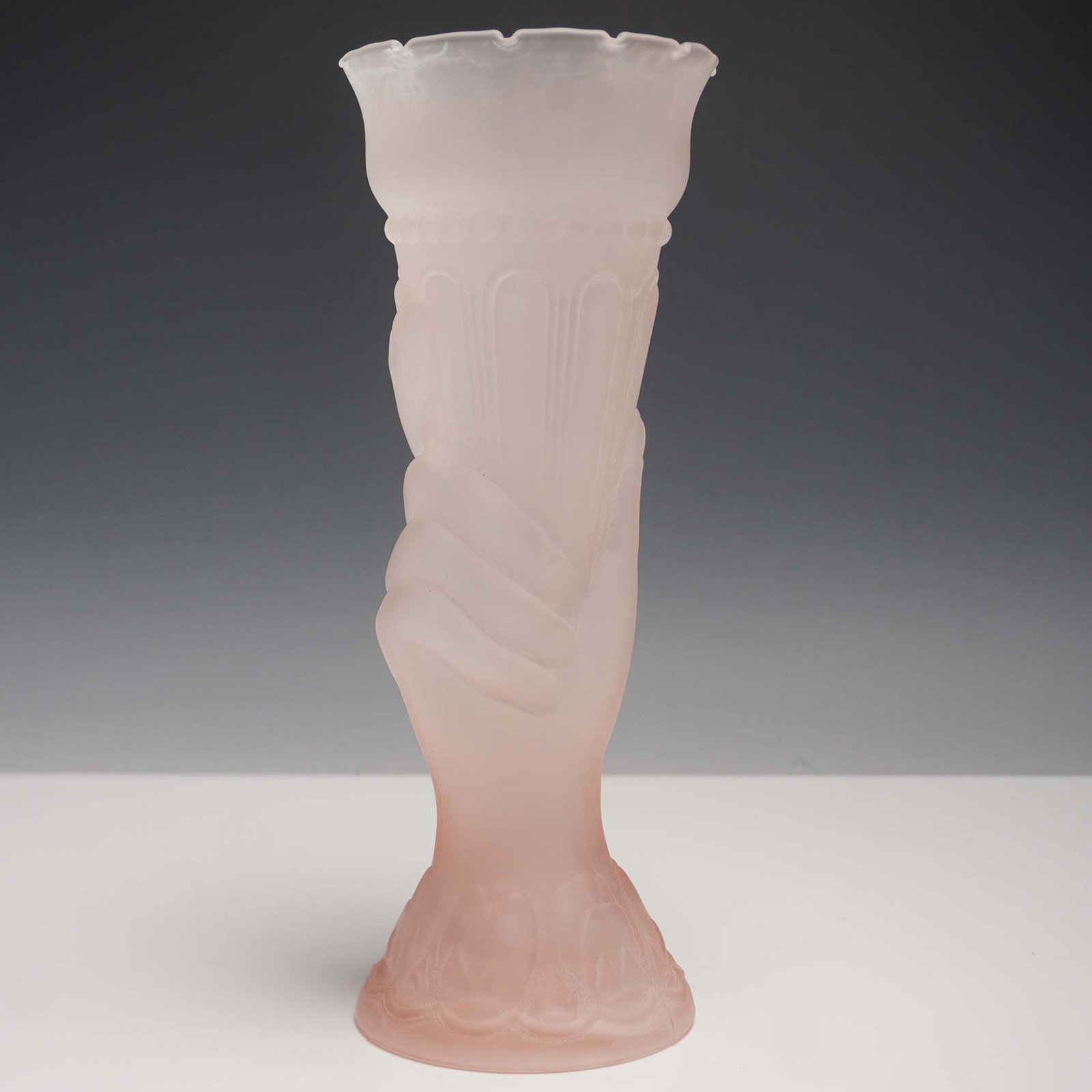Pink Satin Glass Vase, Hand Holding Torch Design: Mid-century pink satin glass vase modeled as a sculptural hand grasping a stylized torch. The frosted glass surface features soft textural detail, including molded vertical fluting and a scalloped rim