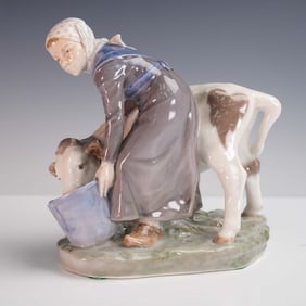 Royal Copenhagen Porcelain Figurine, Girl Feeding Calf