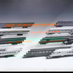 78pc HO Scale Model Train and Building Collection: Comprising 77 total pieces, this HO scale model train and building collection includes a wide assortment of rolling stock, passenger cars, engines, and architectural structures. Train cars feature bra