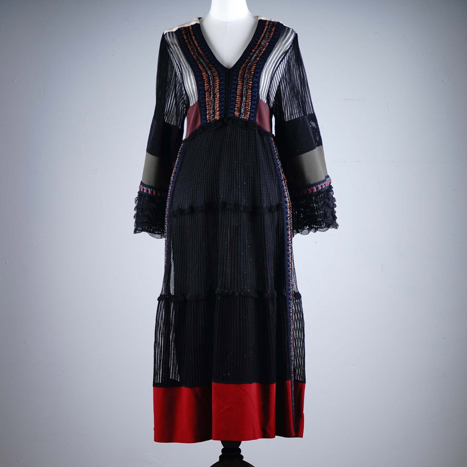 Valentino Embroidered-Textured Party Dress, Size 6: Striking Valentino party dress featuring richly textured fabrics and embroidered ribbon detailing, combining sheer black striped mesh, intricate copper and navy trim, and bold color-blocked panels. Th