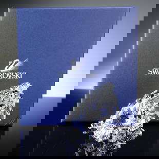 Swarovski Crystal Figurine, Eeyore Disney Winnie the Pooh Series: This captivating Swarovski crystal figurine depicts Eeyore from Disney's beloved "Winnie the Pooh" series. Eeyore is crafted in fully faceted clear crystal that beautifully refracts light, giving a