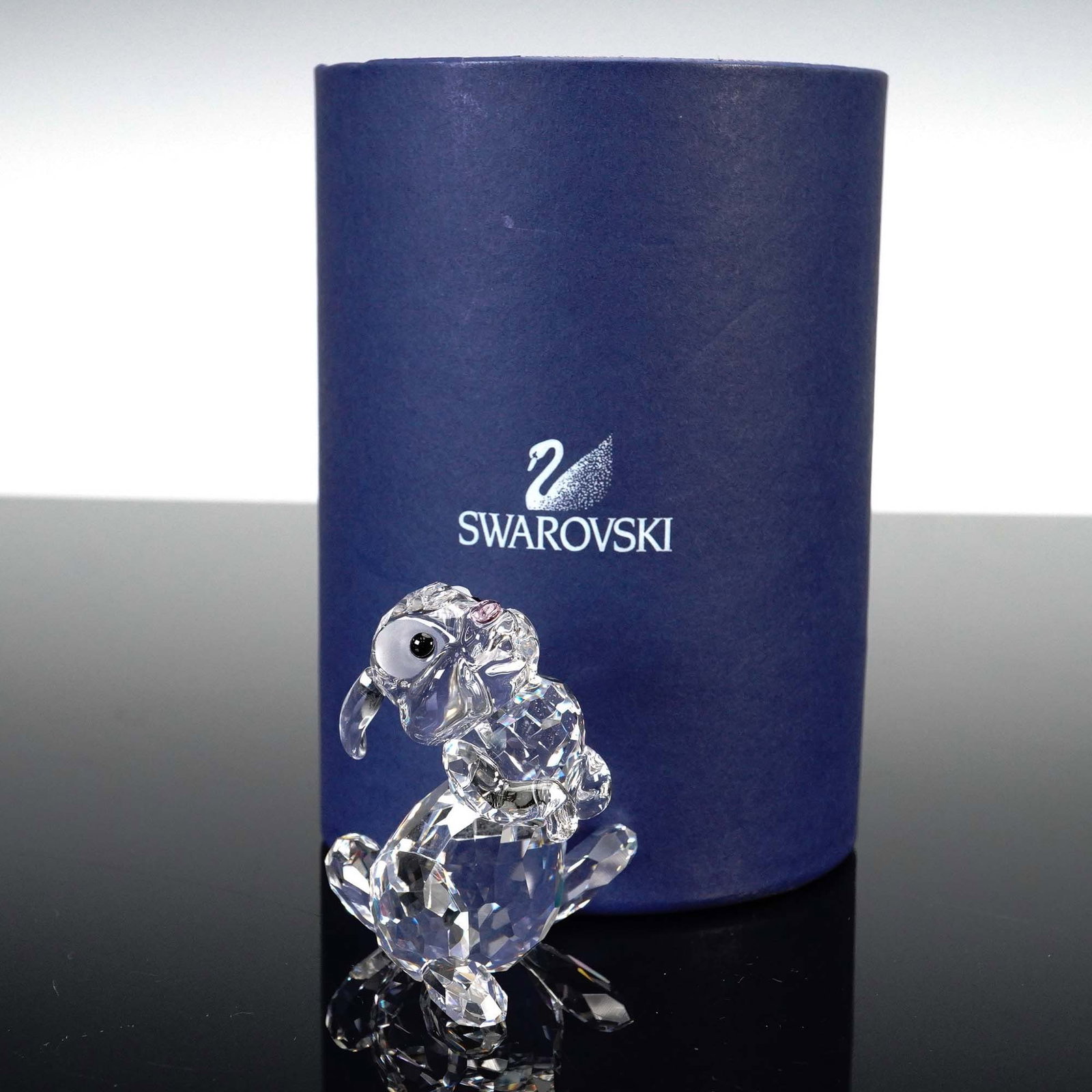 Swarovski Crystal Figurine, Thumper: Lead crystal figurine part of the Bambi series. Bambi's friend thumper rabbit hops along in clear crystal and finished with gleaming jet crystal eyes. His nose sparkles in rose crystal. Swarovski back
