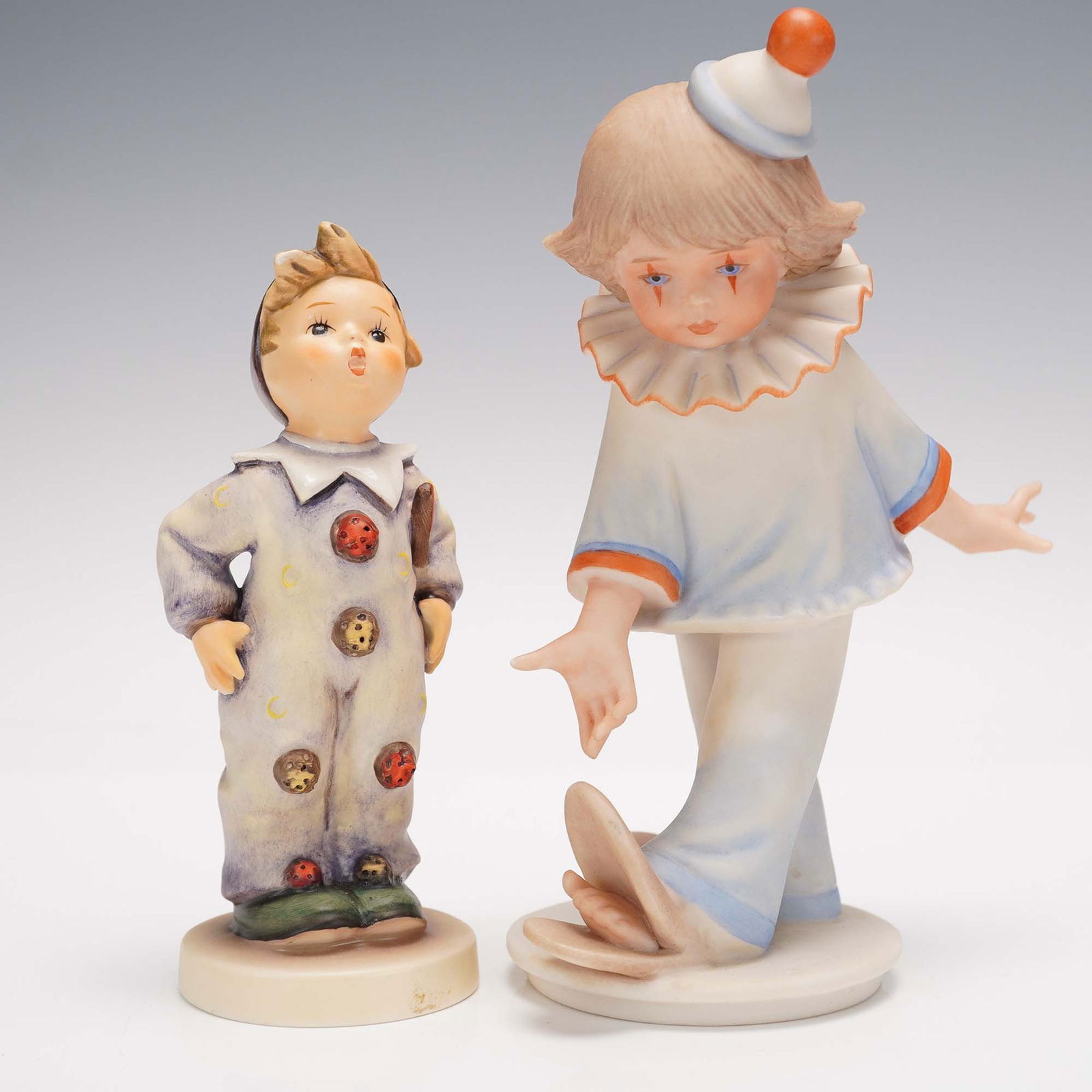 2pc Goebel Porcelain Figurines, In the Spotlight & Carnival 328: This pair of charming porcelain figurines includes one Goebel Collectors' Club limited edition piece titled In the Spotlight, designed by Gerhard Skrobek and marked with the club stamp and number 8222
