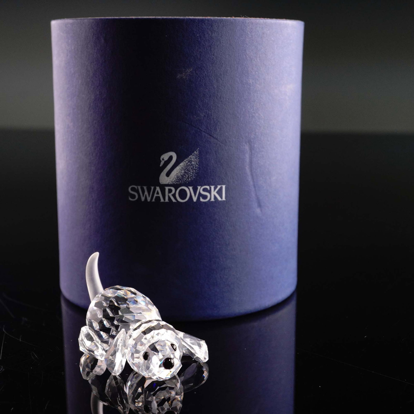 Swarovski Crystal Figurine, Beagle Puppy: Swarovski crystal figurine featuring a delightful Beagle Puppy, crafted with precision and detail. This charming piece showcases Swarovski's signature clear crystal design, capturing the spirit and wa