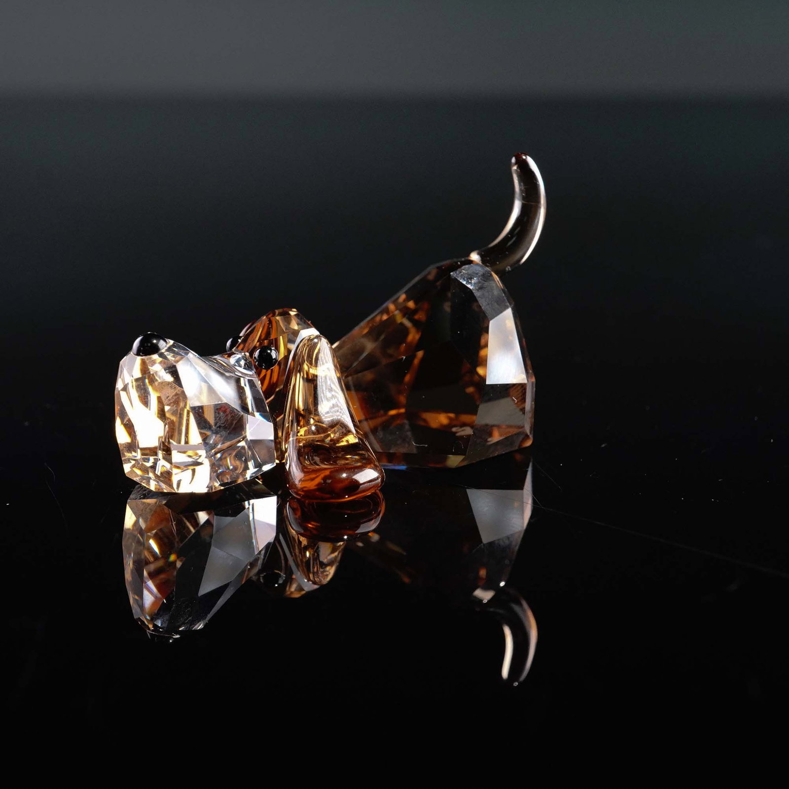 Swarovski Crystal Figurine, Lovlots The Gang of Dogs Peppino: This auction lot features a Swarovski crystal figurine from the Lovlots The Gang of Dogs collection, titled Peppino. Crafted with precision and artistry, Peppino sparkles in brown and clear crystal wi