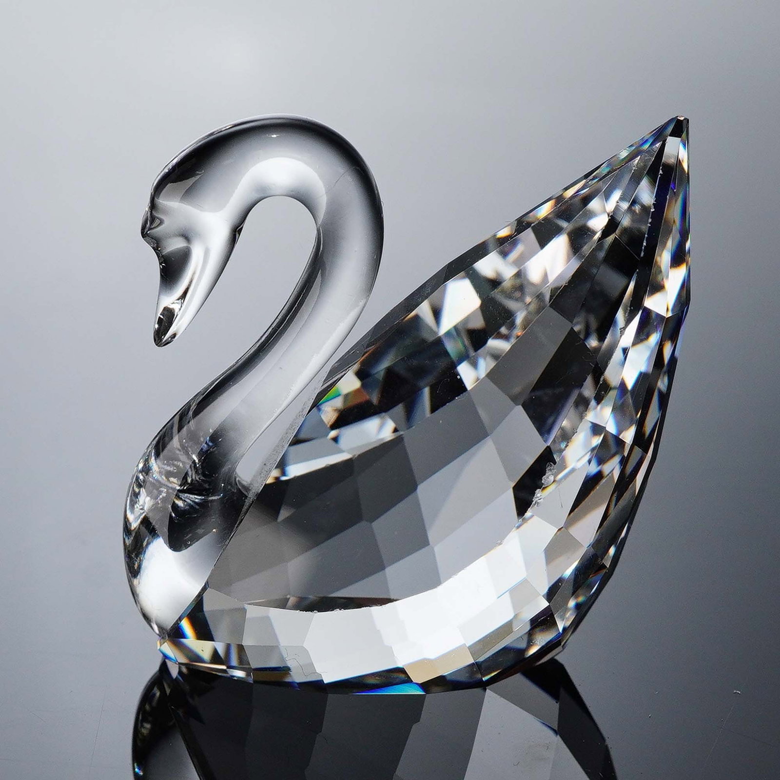 Swarovski Crystal Figurine, Swan Joining Gift: This elegant Swarovski Crystal Swan was issued as a Joining Gift between 1996 and 2004, exclusively available to new members of the Swarovski Collectors Society. Designed by Anton Hirzinger, the swan 