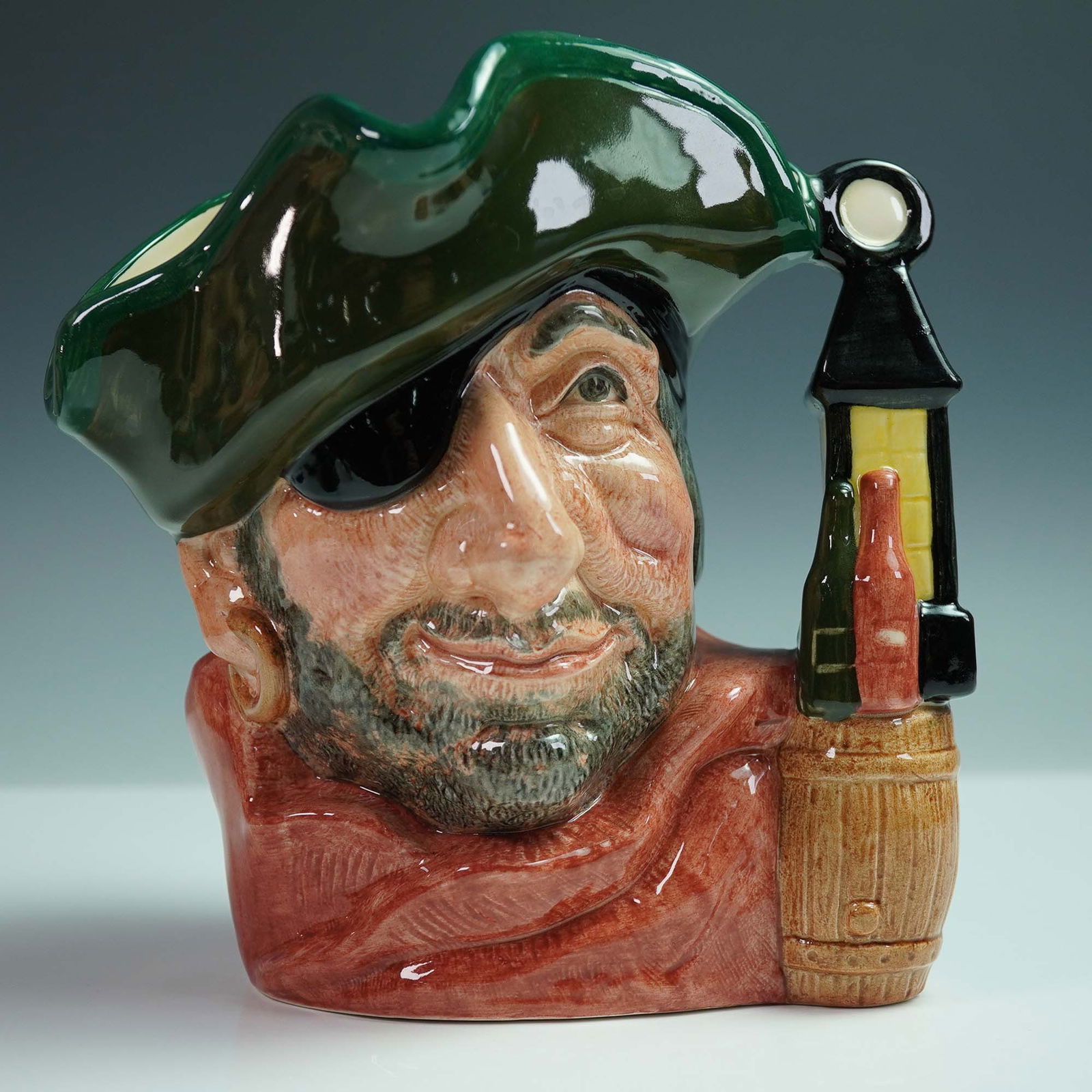 Royal Doulton Character Jug, Smuggler D6616: Captivating large character jug titled Smuggler, model number D6616, issued by Royal Doulton in 1967 and designed by David B. Biggs. This pirate-inspired jug features a rugged seafarer with a knowing