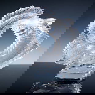 Lalique Crystal Large Sculpture, Double Fish: Originally designed in 1953 by Marc Lalique. This large decorative crystal piece depicts two koi fish arranged in a circular formation, their forms rising together as if breaching water. Executed in