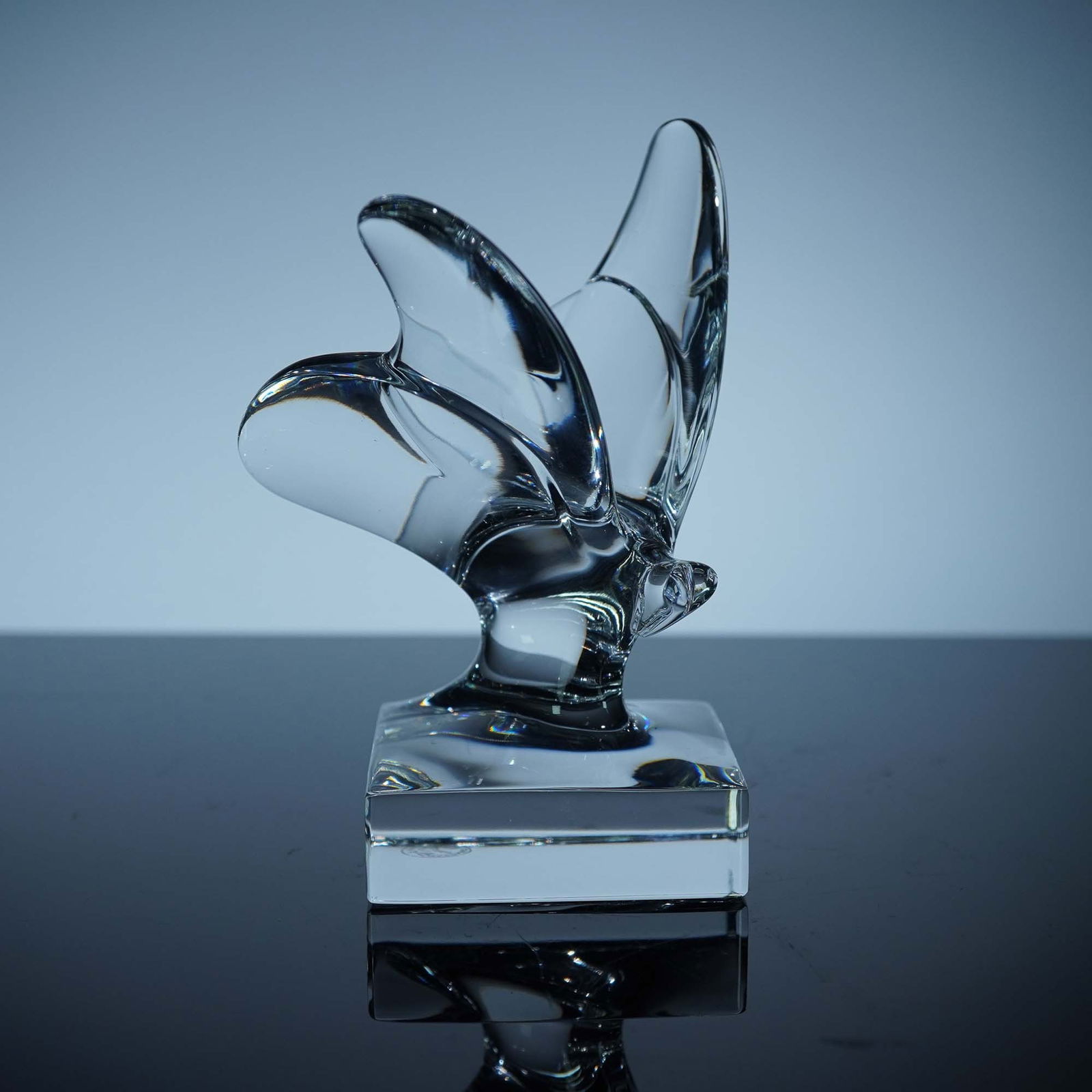 Baccarat Crystal Figurine, Clear Butterfly: Elegant clear crystal butterfly figurine by Baccarat, delicately poised with outstretched wings in a modern, stylized design. Crafted with graceful curves and precision-cut clarity, the butterfly is m