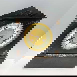 Antique Victorian Slate Mantel Clock: Black in color with marble inlays consisting of brown, beige and green coloring. face is white and gold with black numerals and has glass cover. Pendulum is wrapped in paper in the back of the clock.