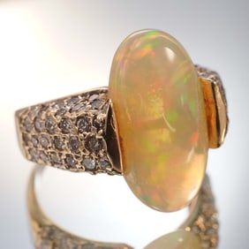 14K Gold Ring with 4.34ct Opal and 1.00ct Diamond Accents