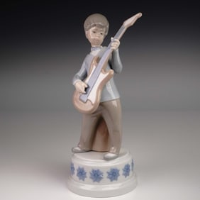 Lladro Porcelain Music Figurine, Boy with Guitar 1004614