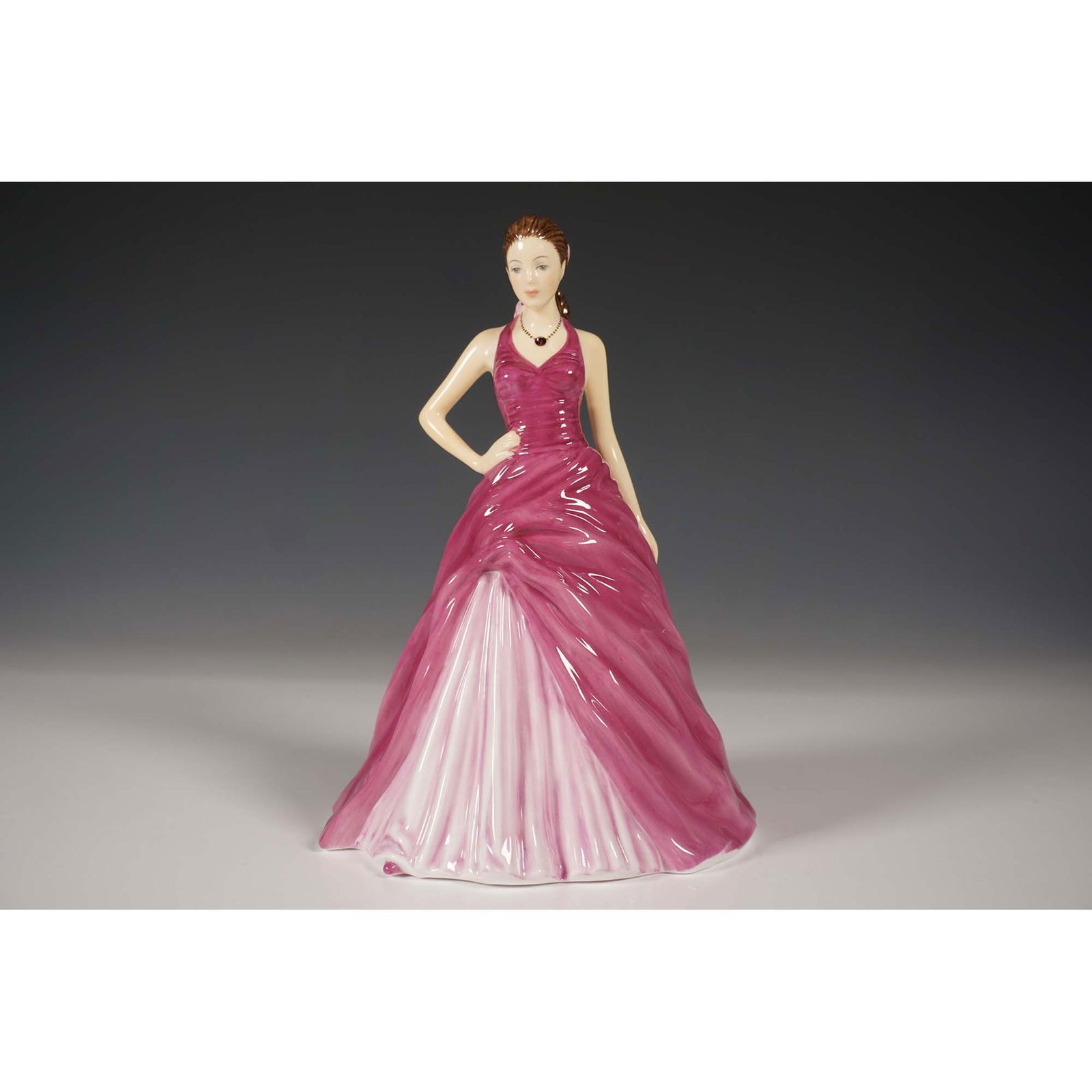 Royal Doulton Birthstones Figurine, February Amethyst HN5627: This exquisite Royal Doulton February Amethyst figurine HN5627 is part of the Birthstones Collection, celebrating the birthstone of February"amethyst. Crafted from fine hand-decorated bone china, this