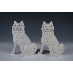 Pair of Decorative Bisque Porcelain Dog Figurines