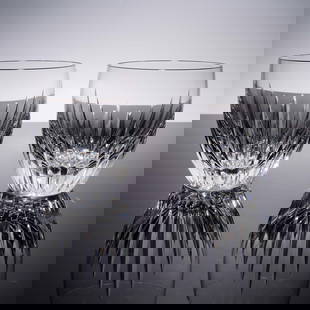 2pc Baccarat Crystal Tumblers, Massena: A pair of finely crafted Baccarat crystal tumblers featuring a radiant vertical cut pattern that captures and reflects light with exceptional clarity. Each glass bears the acid-etched Baccarat France