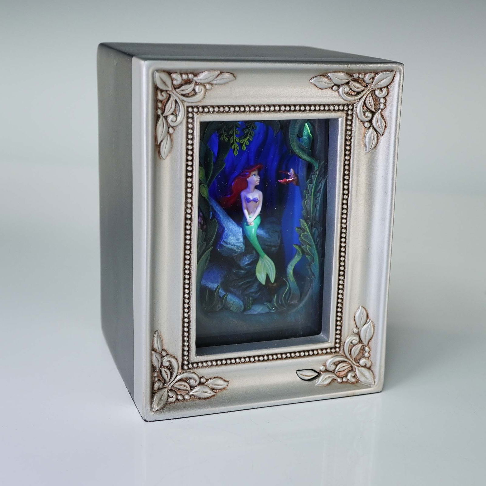 Olszewski Walt Disney Showcase Diorama, Wishing To Be Part Of Your World: Dive into enchantment with this Disney Showcase Collection Gallery of Light diorama titled Wishing To Be Part Of Your World, sculpted by Robert Olszewski. Featuring Ariel from The Little Mermaid seate