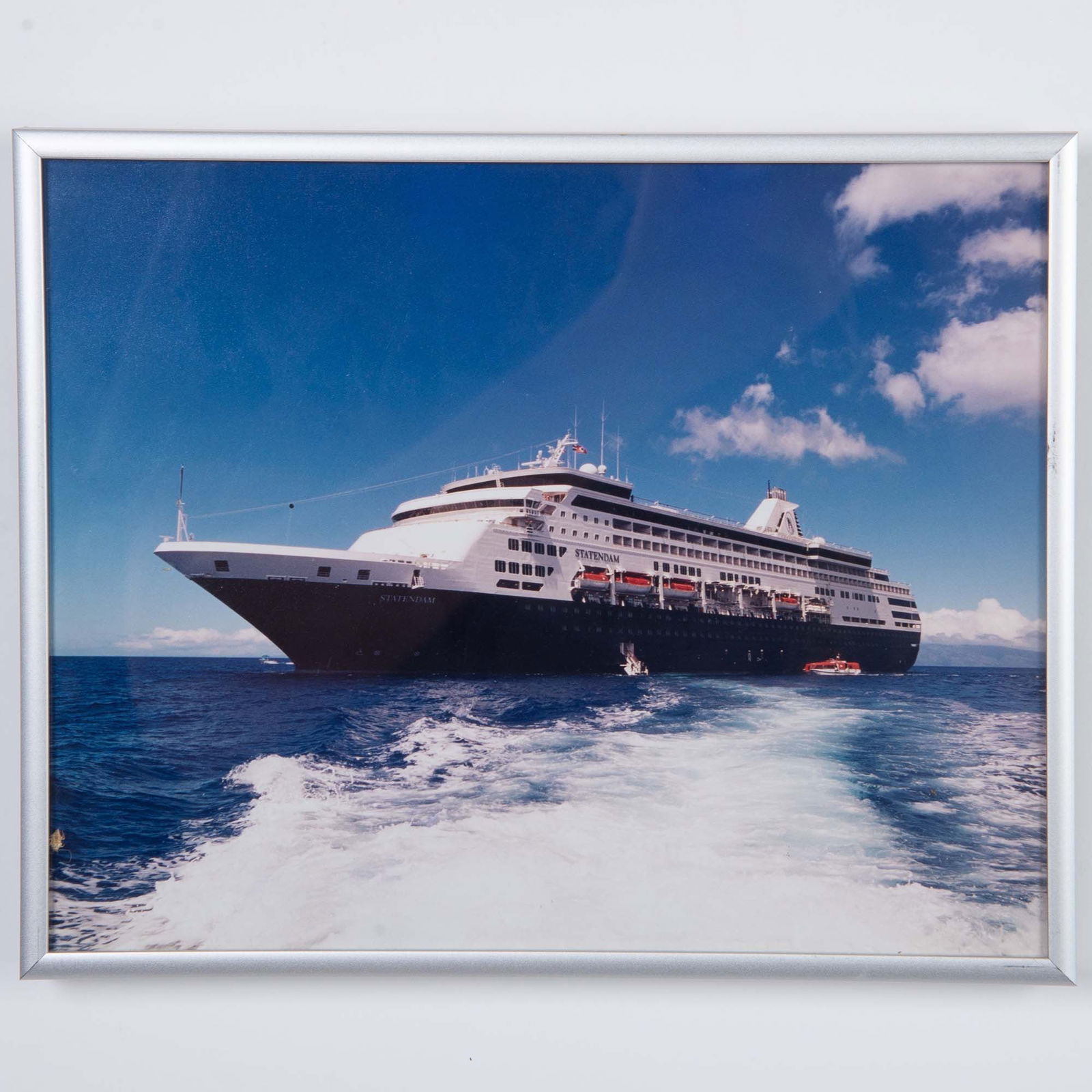 Original Color Photograph on Paper, Statendam Cruise Ship: Original color photograph on paper featuring the cruise ship Statendam at sea. Housed in a metallic frame. Sight size: 9.50"L x 7.75"H. Frame dimensions: 10.25"L x 8.25"H x 1"W. Artwork can be unframe
