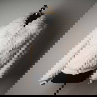 White Dyed Rabbit Fur Bomber Jacket, Size M: This striking white bomber-style jacket is crafted from luxuriously soft dyed rabbit fur and offers both warmth and high-fashion flair. Fully lined with smooth satin and featuring a sturdy front zippe