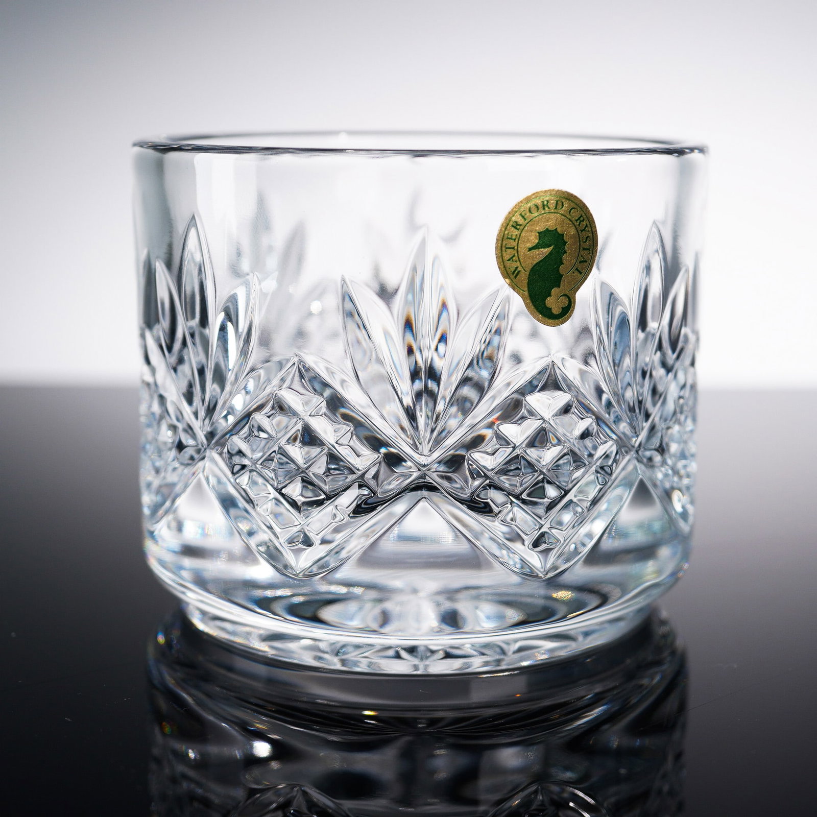 Waterford Crystal Stacking Container, Lismore Diamond Cut: Crafted by the renowned Irish brand Waterford, this sparkling crystal stacking container showcases the elegance and clarity synonymous with their heritage of fine craftsmanship. The piece features the