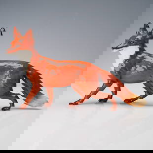 Beswick Porcelain Figurine, Standing Fox: A hand-painted Beswick porcelain figurine depicting a poised red fox in mid-stride. Modeled with lifelike detail, the fox features a glossy burnt orange coat with shaded white chest and tail tip, as w