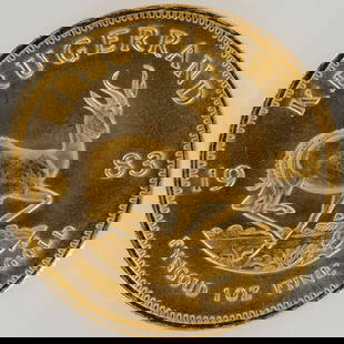1983 South African 1 oz Gold Krugerrand Coin: 1983 South African Gold Krugerrand coin encapsulated in a protective slab. The obverse displays a portrait of Paul Kruger, the former president of the South African Republic, accompanied by the inscri
