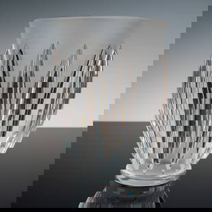Lalique France Crystal Vase, Courchevel: A striking Lalique France Courchevel vase, showcasing bold vertical ridges sculpted in alternating clear and frosted crystal. Signed Lalique France to the base. Issued: 20th century Dimensions: 8"H Co