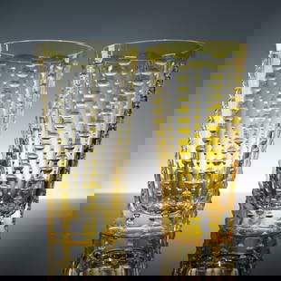 Pair of William Yeoward Crystal Lulu Yellow Highball Glasses: Chic, sculptural, and unmistakably refined " this pair of Lulu highball glasses by William Yeoward exemplifies modern luxury in cut crystal. The bold yellow overlay, precision-applied over clear cryst
