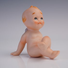 Bisque Porcelain Figurine, Seated Kewpie with Wings