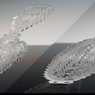 Lalique France Frosted Crystal Bottle: Finely crafted Lalique France crystal bottle featuring frosted and clear motifs with rounded lobes and a broad leaf-form stopper. This sculptural vessel showcases Lalique's signature satin-finished gl