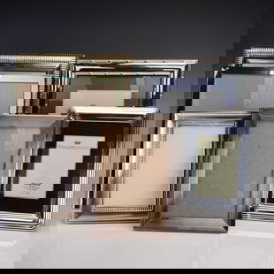 6pc Silver-Plated & Metallic Photo Frame Set: Group of six assorted tabletop photo frames in a range of traditional styles. Several are silver-plated, including a few by Philip Whitney Ltd. Designs feature ribbed edges, beaded borders, and smooth