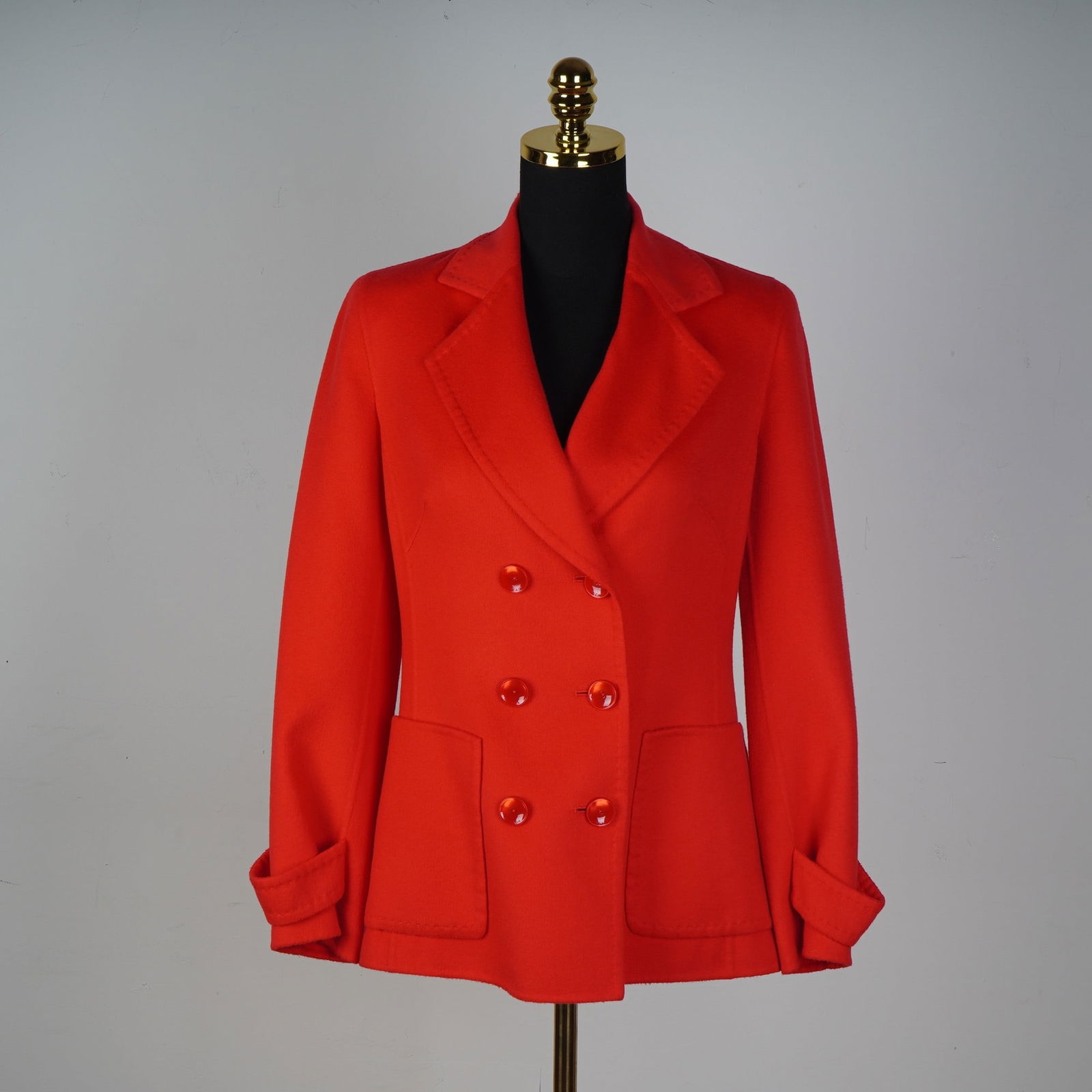 Escada Red Cashmere Blazer, Exclusive for Neiman Marcus: This striking red blazer from Escada, crafted exclusively for Neiman Marcus, showcases timeless luxury in pure cashmere. The double-breasted design is accented by six bold red buttons and wide notch l