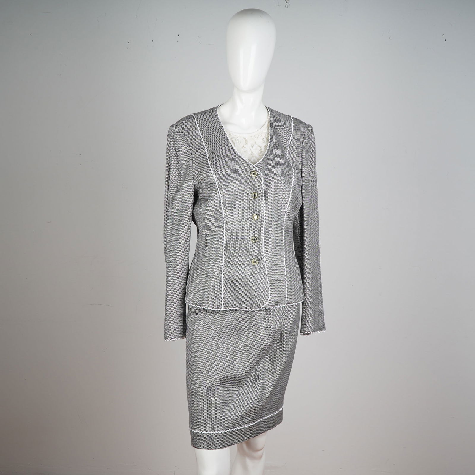 Margaretha Ley for Escada 3 pc Ensemble Skirt Suit: Step into classic sophistication with this stunning vintage Escada Margaretha Ley skirt suit, expertly crafted in Germany. This beautifully tailored ensemble features a refined micro-houndstooth fabri