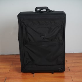 TUMI Black Ballistic Nylon Wheeled Suitcase with Red Interior