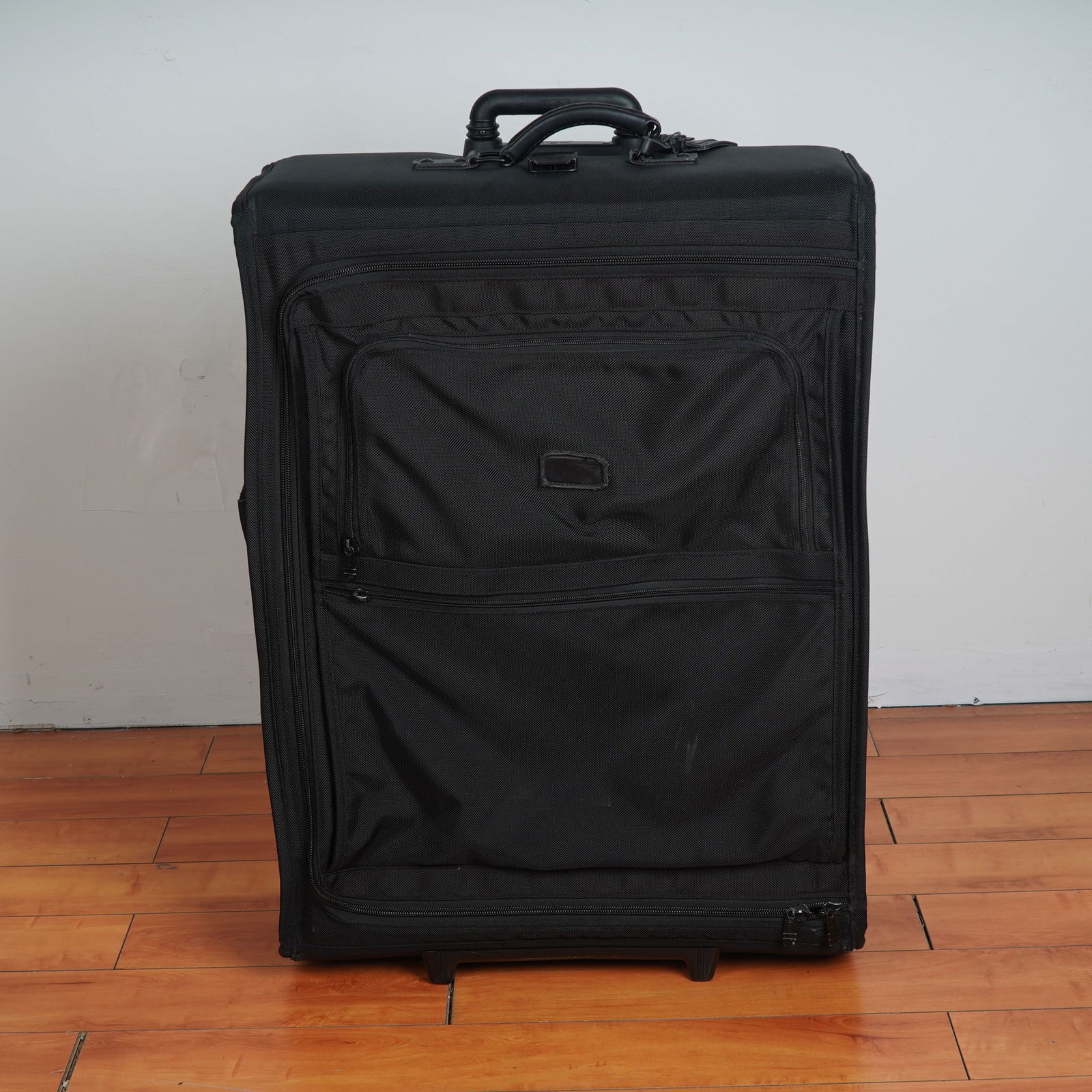 TUMI Black Ballistic Nylon Wheeled Suitcase with Red Interior (1 of 7)
