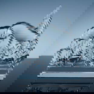 Baccarat Crystal Figurine, Gazelles: A clear crystal relief panel depicting a group of stylized gazelles in motion, sculpted in an angular Art Deco inspired design. The elegant antelopes are rendered with smooth, flowing lines and set ag