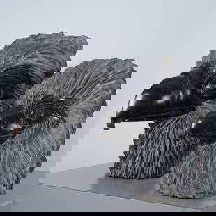 William Reed, Black Marble Eagle & Eaglet Heads, Signed: A striking pair of hand-carved black marble eagle and eaglet heads by contemporary sculptor William Reed. These commanding sculptures showcase the artist's mastery in stone carving, capturing the intr