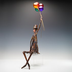 J. Lewk Metal and Glass Figurine, Man with Balloons