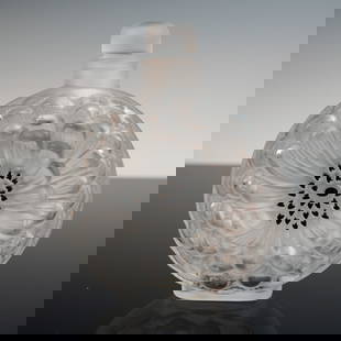 Lalique Frosted Crystal Perfume Bottle, Dahlia: Lalique France frosted crystal perfume bottle in the Dahlia pattern, featuring an intricately molded flower motif with deeply petaled relief radiating from a central seed cluster. This rounded, elegan