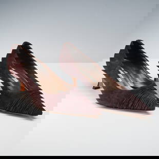 Manolo Blahnik Brown Ruched Suede Heels: A richly textured pair of pointed-toe heels by Manolo Blahnik, crafted in deep brown suede and featuring elegant ruching across the vamp for a refined visual detail. The kitten heel design adds subtle