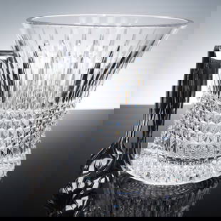 2pc Waterford Lismore Diamond Ice Bucket and Tongs: This Waterford crystal ice bucket hails from the distinguished Lismore Diamond collection, showcasing a bold flared shape adorned with striking cuts. The design features long vertical wedge cuts and i