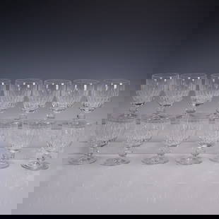 13pc Waterford Crystal Maureen Cut Water Goblets: A 13-piece set of Waterford crystal water goblets in the Maureen cut pattern. Each goblet showcases a generously rounded bowl adorned with deep vertical fluting, set on a short stem -delivering the br