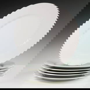 6pc Tiffany & Co. White Porcelain Charger Plate Set: A 6-piece set of elegant porcelain charger plates by Tiffany & Co., designed in a classic, minimalist white. Each plate measures 12.25" in diameter, making them ideal for use as charger plates beneath
