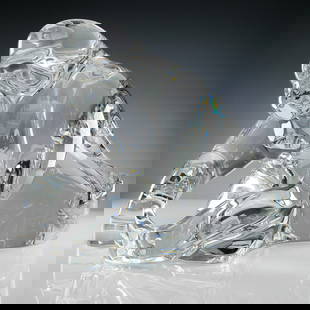 Rare Baccarat Crystal Signed Sculpture, Silverback Gorilla: Very rare, one of a kind limited edition crystal sculpture of a gorilla. This exquisite rendered figure captures the strength and majesty of a gorilla in seated posture, carved from a single mass of c