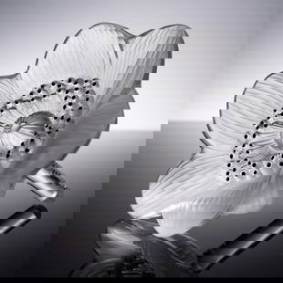 Lalique Crystal Floral Sculpture, Anemone: A Lalique France crystal sculpture elegantly formed in the shape of an anemone flower, showcasing a refined contrast between clear and frosted finishes. The delicately ribbed petals encircle a center