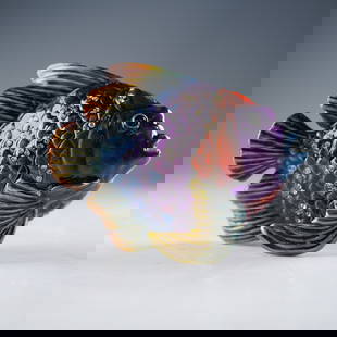 Rucinni Jeweled Fish Trinket Box with Swarovski Crystals: A vivid and richly enameled Rucinni fish-form trinket box featuring a spectacular array of jewel-toned scales in deep purple, red, blue, and gold hues. The sculpted body is adorned with multicolored S