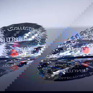 Swarovski Collectors Society Crystal Plaque, Antonio 2003: The plaque features precise etched lettering reading "Swarovski Collectors Society," "ANTONIO," and "Martin Zendron - 2003." Designed in a half-fan shape, the piece incorporates two round red crystal