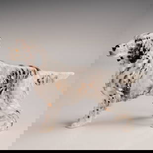 Royal Doulton Porcelain Figurine, English Setter HN1050: This Royal Doulton porcelain figurine, model HN1050, portrays an English Setter in a dynamic pointing stance. Expertly hand painted in a blend of white, gray, and black with orange accents, the figure