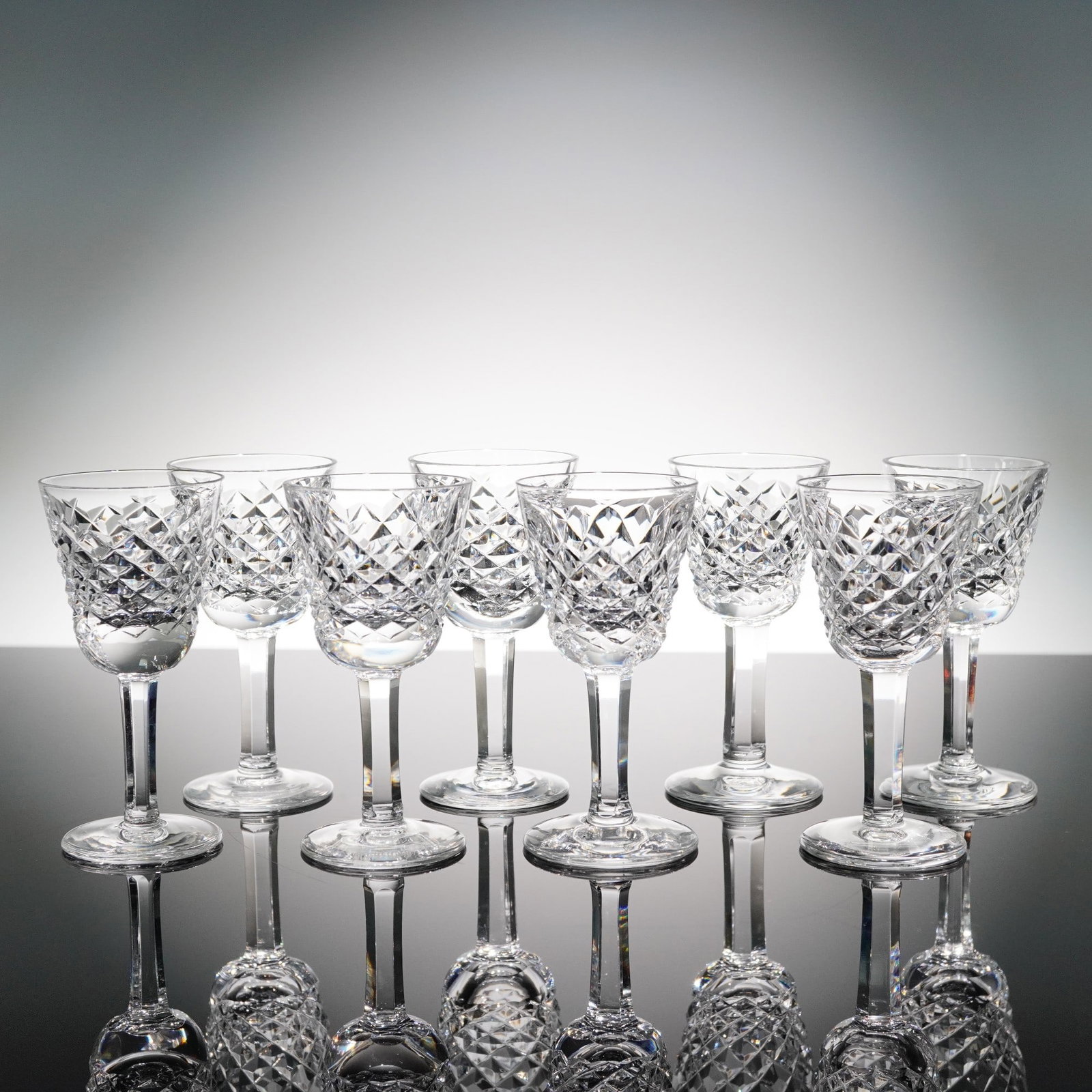 8pc Waterford Crystal Liqueur Cordial Glasses, Alana: From the renowned Alana collection by Waterford Crystal, this set of eight small liqueur or cordial glasses features the distinctive crosshatch and vertical wedge cut design that defines the pattern.