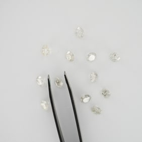 12 Loose Round Brilliant Cut Diamonds
